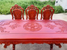 Bộ bàn ăn chữ nhật bo góc 8 ghế hồng hạt gỗ hương đá (Anh Minh, Bắc Ninh) 16 mặt bàn khung tranh ván liền chạm hoa lá tây