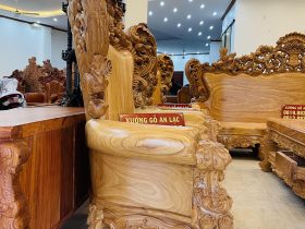 Bộ bàn ghế hoàng gia nguyên khối 10 món gỗ gõ đỏ hàng vip (Anh Đàn - An Giang) 31 vai ghế ôm cong đục hoa lá tây