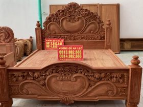 giường ngủ mẫu hoa hồng nguyên khối gỗ hương đá