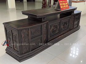Mẫu kệ tivi 2m6 vát cong gỗ mun hoa Lào đục trống đồng (Chú Hữu - Thanh Hóa) 7 thân kệ thiết kế ngăn kéo và tủ đục họa tiết
