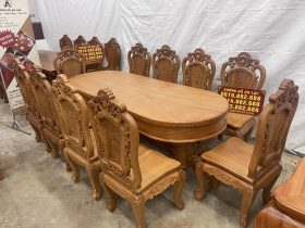 bàn ăn tròn bầu dục cùng 8 ghế hồng hạt gỗ gõ đỏ